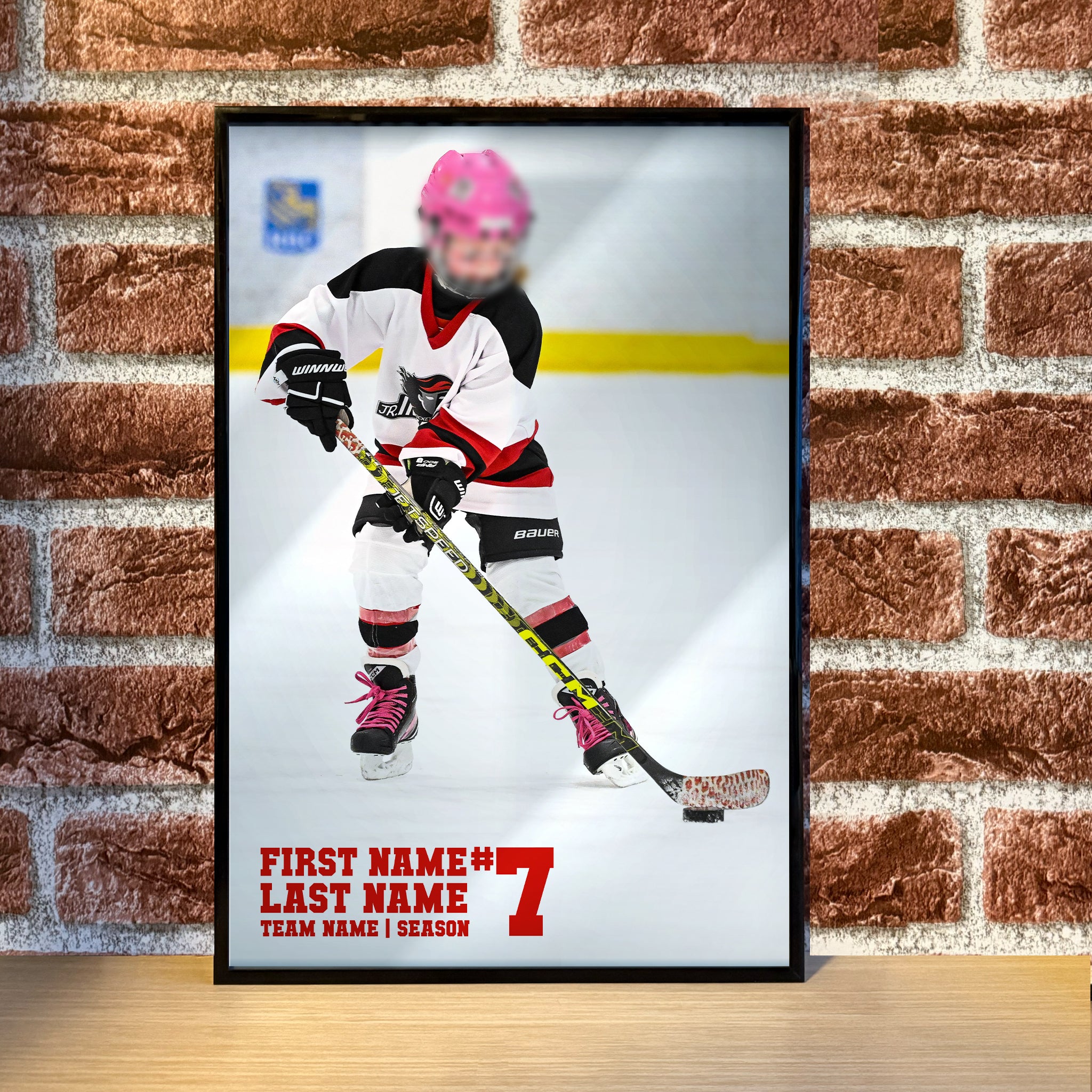 Personalized hockey poster showing child's name, jersey number, team and year inset on an action shot of the child, perfect for kids room or team gift.
